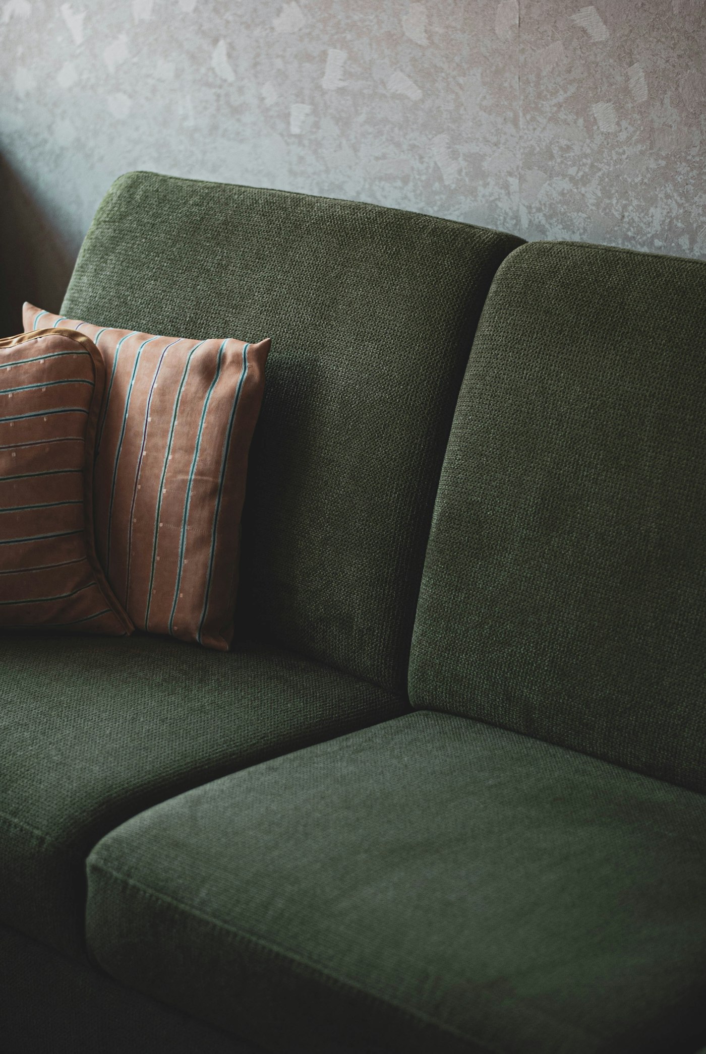 Green upholstered sofa